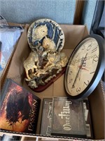 Clock , wolf figurines and DVD and CD