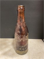 Brown coca-cola bottle