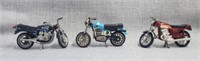 3 toy motorcycles
