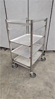 1/2 SIZE S/S BAKERS RACK ON WHEELS W 3 ALUM. TRAYS