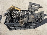 Crate of drills, jig saws, reciprocating saw