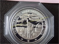 Proof One ounce .999 silver round marked on edge