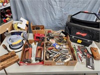 Assorted tools and toolboxes.  Buffer, clamp,