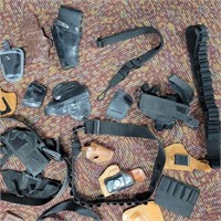 Box of assorted holsters & ammo belts