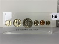 COIN SET IN LUCITE HOLDER