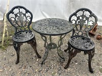 CAST IRON ORNATE TABLE AND 2 CHAIRS