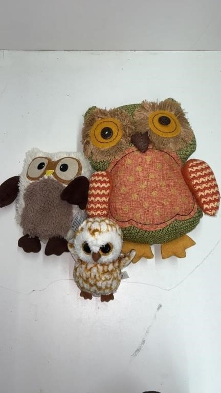 Three stuffed toy owls