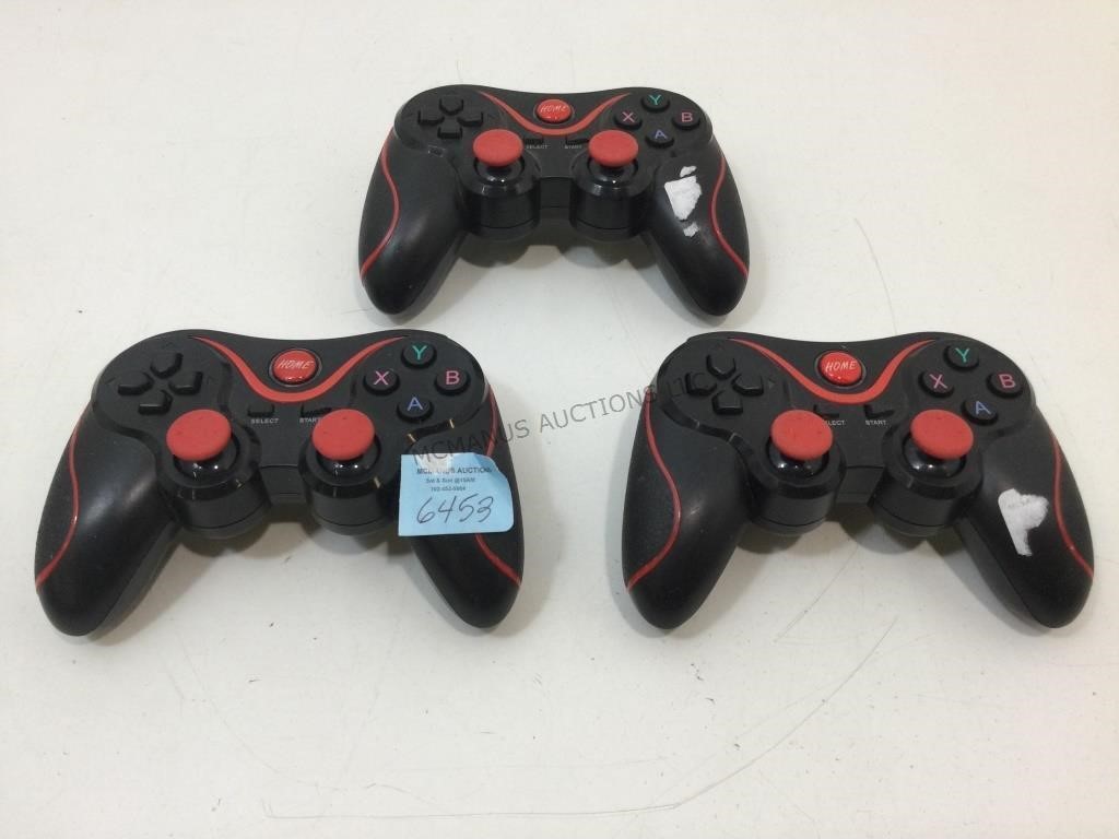 3 gaming controllers.