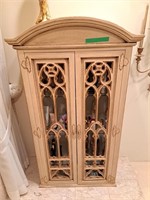 Unique Cabinet with Glass Shelves.  Currently