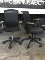 2 Rolling adjustable ergonomic office chairs.