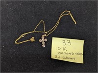 10k Gold 2.1g Diamond Cross Necklace