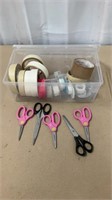 Various tape and scissors. Plastic container/lid