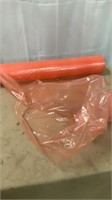 Part Roll of orange plastic bags