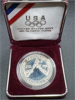 UNITED STATES 1988 $1 OLYMPIC COIN IN BOX