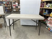 Foldable table 48in long 24in wide 29 1/2 in tall