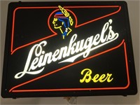 Leinenkugel’s Beer lighted sign and hanging canoe