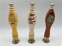 3 Leinie’s tap handles