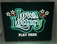 Iowa lottery play here lighted sign.