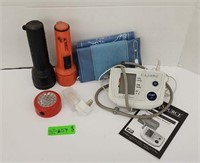 Flashlights, and blood pressure cuff.