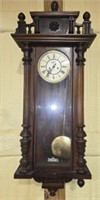 Vintage mahogany and porcelain face wall clock