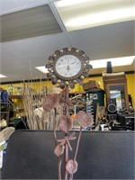 iron stand with clock