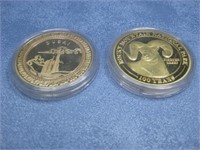 Two Challange Coins Pictured