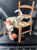 Retro Stretching Cat in Chair Sculpture