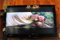 LG 55" Flatscreen TV, mounted on Wall