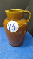BROWN EARTHENWARE WATER PITCHER