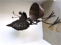 Metal bug with small pot