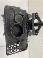 Miniature cast iron and tin stove