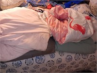 4 king comforters used one has flamingos.
