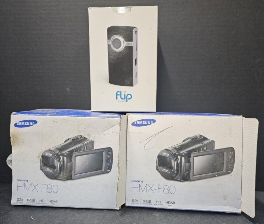 (AR) Flip Video 8GB Camcorder And Two Samsung