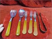 Bakelite utensils & brass tongs.