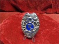 Allied University Security badge.