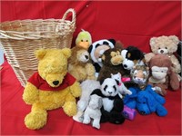 Stuffed animals in basket.