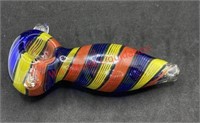 Glass pipe with red yellow and dark blue stripes