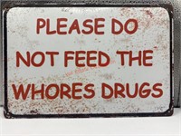 Please don’t feed the whores drugs tin sign