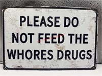 Please don’t feed the whores drugs tin sign