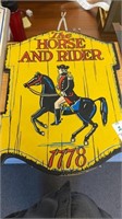 Wooden horse and rider 1778 sign