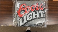 Inflatable Coors light beer, car with