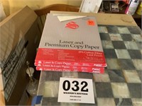 Three packs of laser and premium copy paper