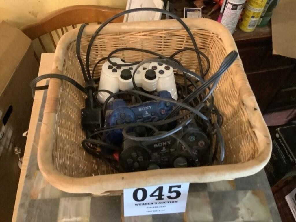 A basket full of Sony, PlayStation remotes