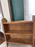 Wooden three shelf bookshelf