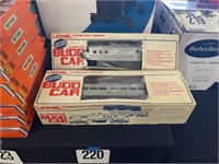 SET OF 2 LIONEL BUDD TRAIN CARS