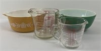 Four pieces of Pyrex including 2 measuring cups