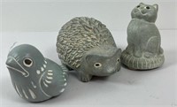 Three Isabel Bloom sculptures depicting a bird, a