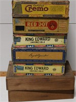 5 cigar boxes and 2 wooden boxes