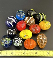 14 miniature glass eggs. Quail size.