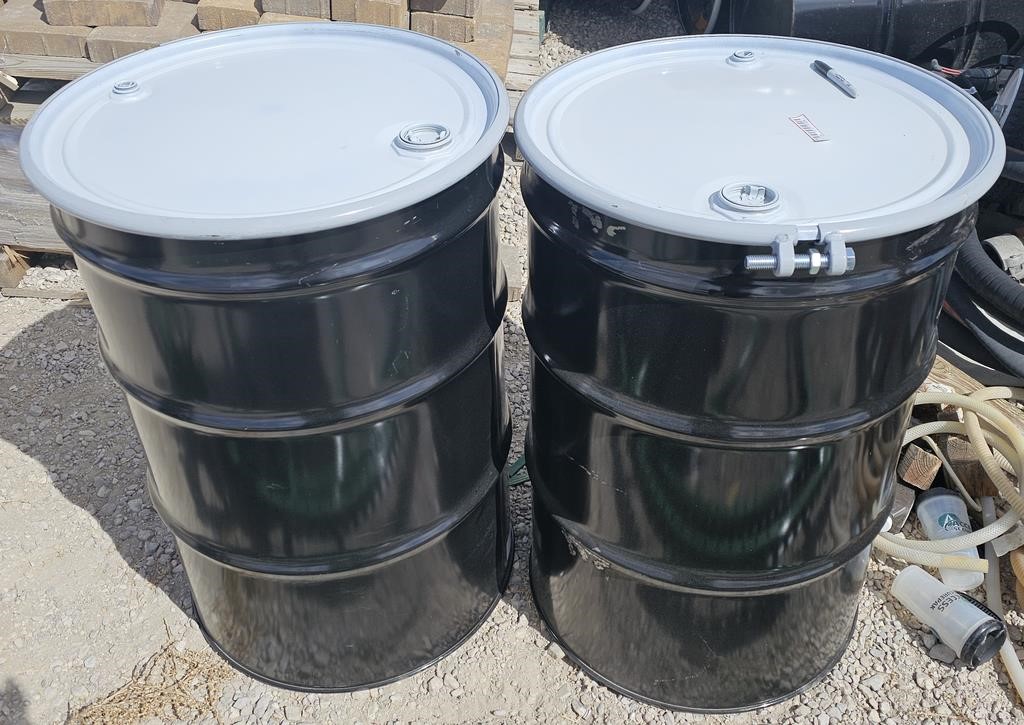 2 Black 55 gallon metal drums